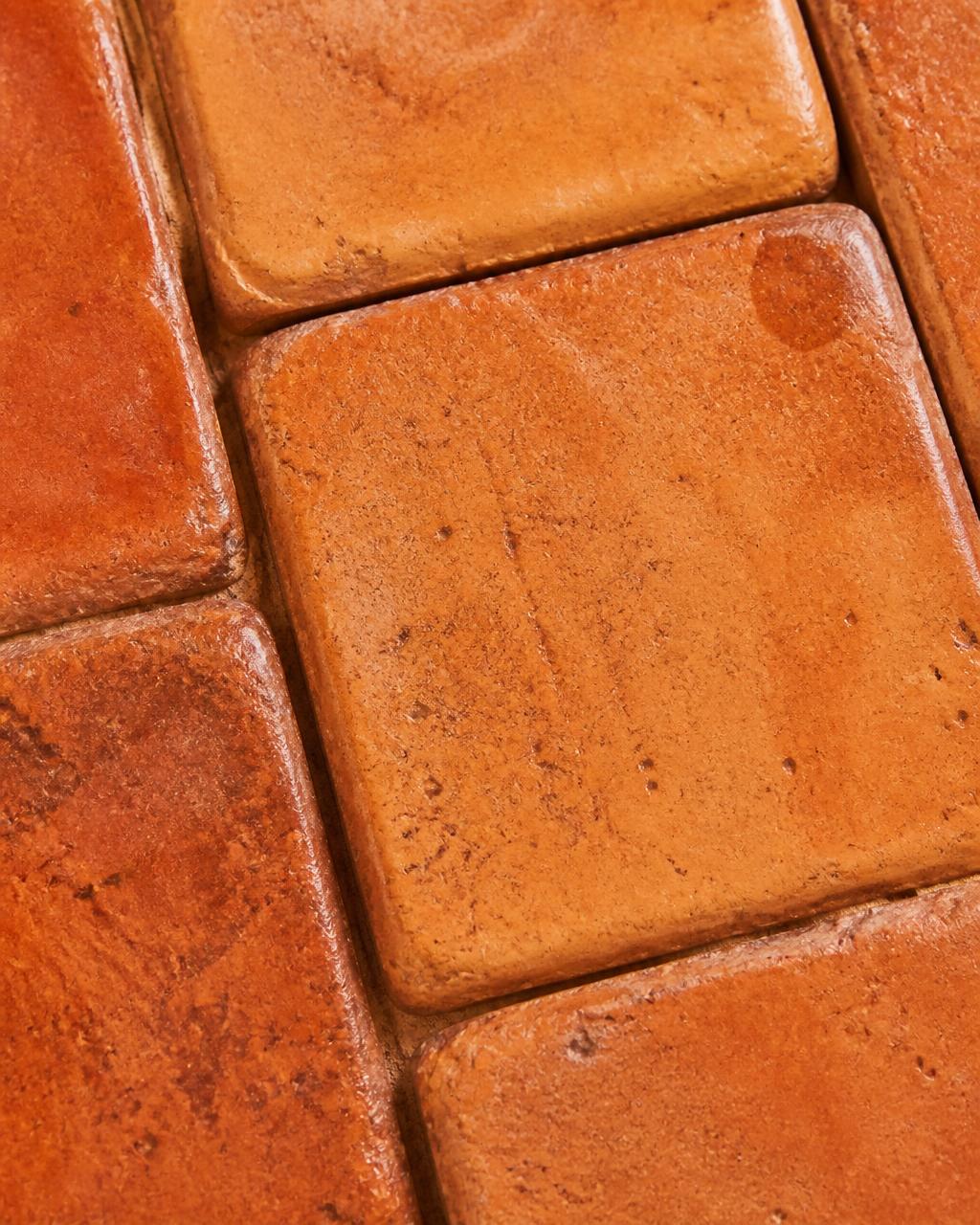 Close up texture of hand-fired terracotta tiles